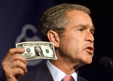 Bush Holding Dollar